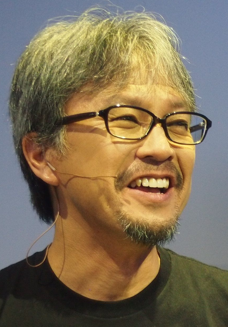 Cropped photograph of Eiji Aonuma.