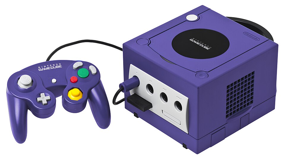 Purple Nintendo GameCube console with memory card and controller