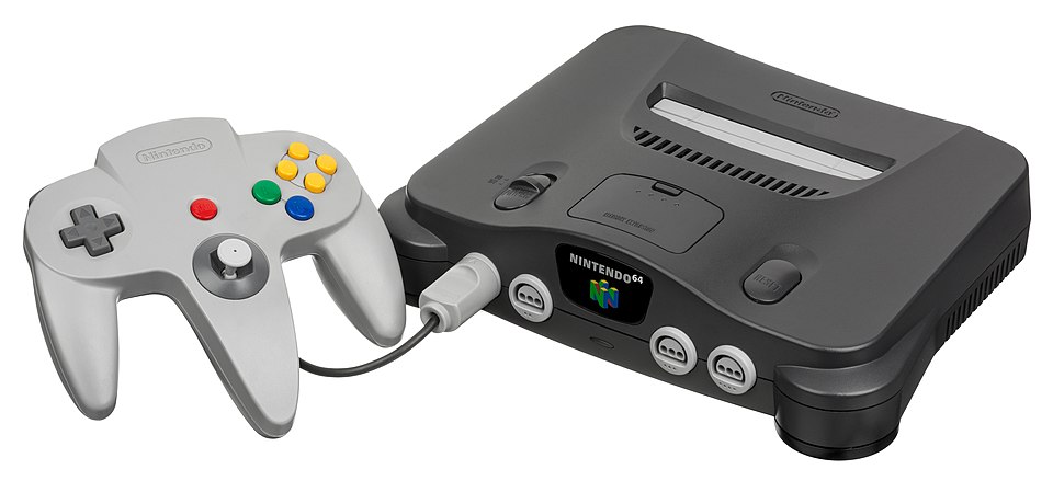 A grey Nintendo 64 console shown with its three-pronged grey controller.