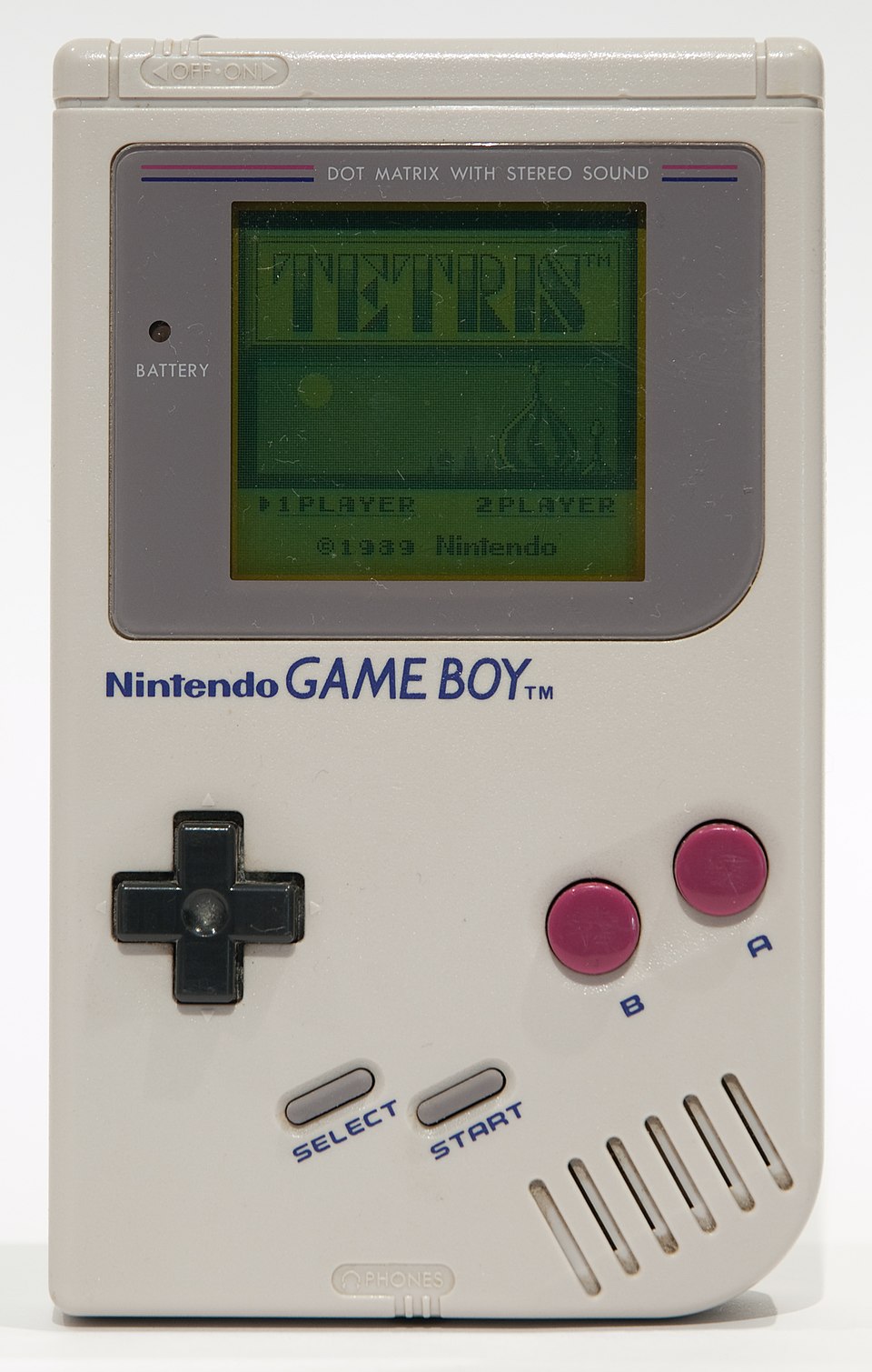 A Game Boy handheld displaying a game of Tetris|
