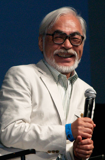 Hayao Miyazaki seated at a convention panel in 2009.