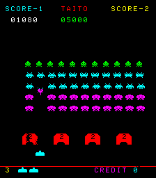 A screenshot of the Space Invaders II arcade video game showing rows of alien invaders on a dark screen.