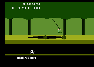 Gameplay screen with the player character amid trees, a vine, and a hazard.
