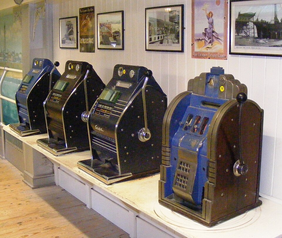 A row of coin-operated slot machines.