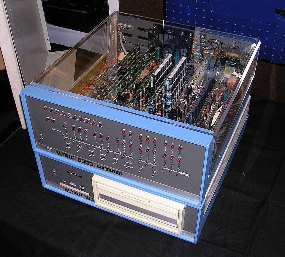 The Altair 8800 computer with an 8-inch floppy disk system and stacked circuit boards.